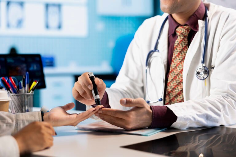 Medical consultation with physician using an insulin injector for a patient
